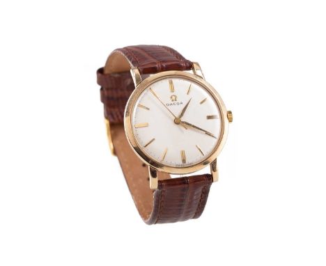 GENTLEMAN'S OMEGA NINE CARAT GOLD MANUAL WIND WRIST WATCH,the round cream dial with applied baton hour markers, outer seconds