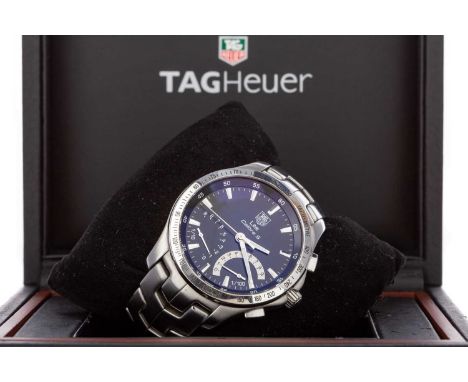 GENTLEMAN'S TAG HEUER LINK CALIBRE S STAINLESS STEEL QUARTZ WRIST WATCH,the round black dial with applied baton hour markers,