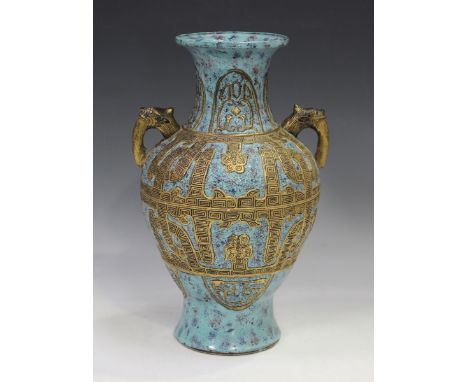 A Chinese turquoise enamelled and gilt moulded biscuit porcelain archaistic vase, mark of Qianlong but late Qing dynasty, the