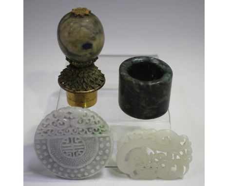 A Chinese gilt metal and hardstone mandarin's hat finial, height 6.6cm, together with a white jade dragon pendant, length 5cm