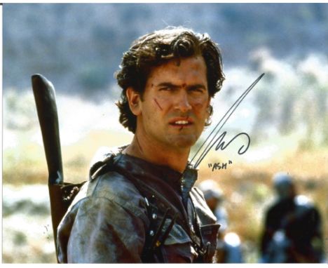Bruce Campbell The Evil Dead hand signed 10x8 photo. This beautiful hand signed photo depicts Bruce Campbell as Ash in the hi