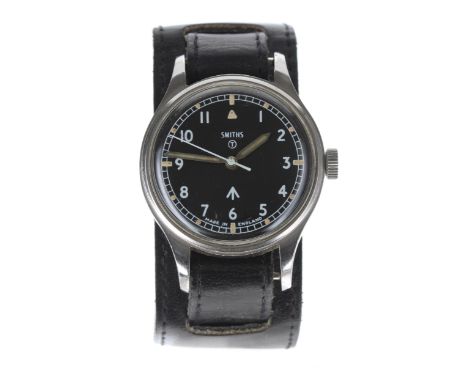 Smiths British Military Army issue stainless steel gentleman's wristwatch, circa 1970, circular black dial with Military arro