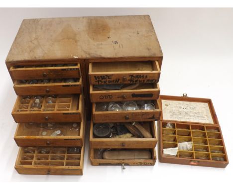 Wooden chest containing a quantity of various sized watch glasses, quantity of various watch/clock makers tools, small quanti