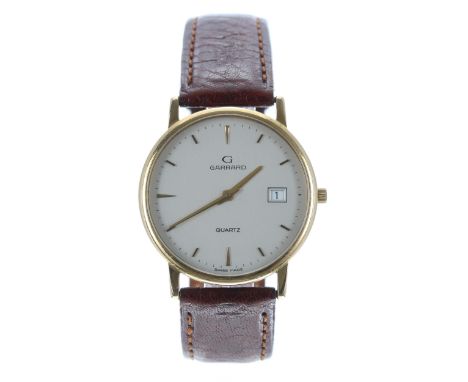 Garrard Quartz 9ct gentleman's wristwatch, case no. 23xx, silvered dial with hour markers, minute markers and date aperture, 