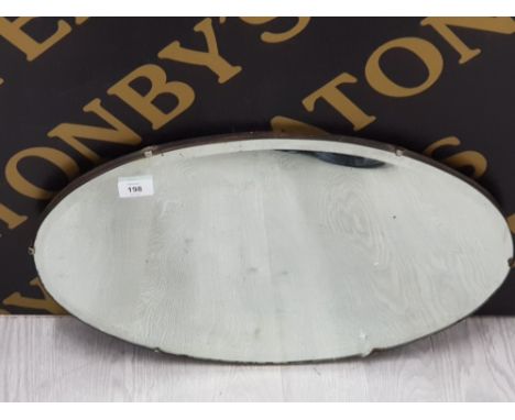 VINTAGE OVAL SHAPED FRAMELESS MIRROR