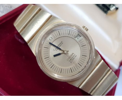 18CT YELLOW GOLD ELECTRONIC OMEGA WRISTWATCH, CONSTELLATION CHRONOMETER, CHAMPAGNE DIAL, BLACK MARKERS, IN GOOD WORKING CONDI