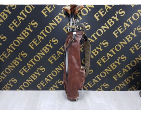 VINTAGE LEATHER GOLF BAG WITH WILSON CUP DEFENDER CLUBS ETC