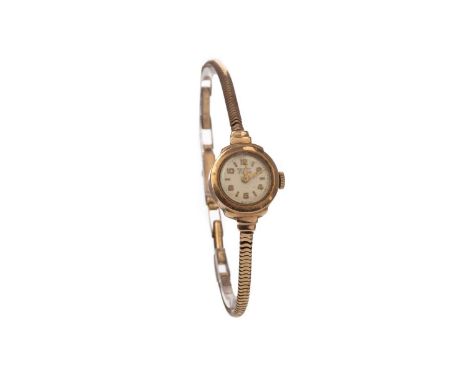 LADY'S ROTARY NINE CARAT GOLD MANUAL WIND WRIST WATCH,the round cream dial with applied Arabic and baton hour markers, outer 