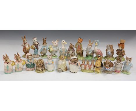 Twenty-three Beswick Beatrix Potter figures, comprising Little Pig Robinson, gold backstamp mark BP-2, Peter Rabbit tradition