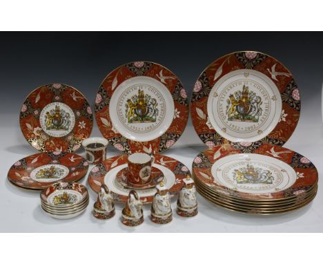 Four Royal Worcester limited edition candle snuffers from the Queen Elizabeth II Golden Jubilee Collection, modelled as two u
