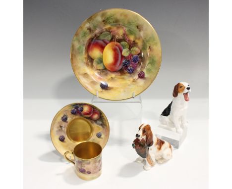 A Royal Worcester fruit painted cabinet cup and saucer, circa 1925, painted by Moseley and W. Powell, diameter of saucer 11.2