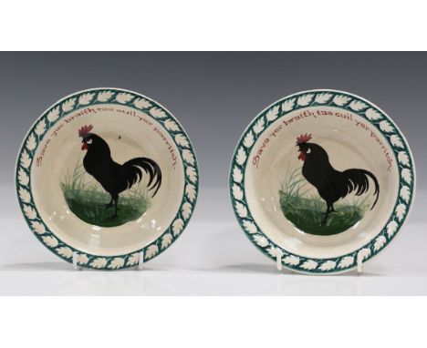 Two Wemyss pottery porridge bowls, circa 1900, both painted with a black cockerel beneath inscription 'Save yer braith tae cu