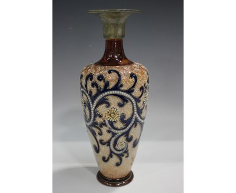 A Royal Doulton stoneware vase by George Tinworth, monogrammed, the tapered body with brown and green glazed flared rim neck,