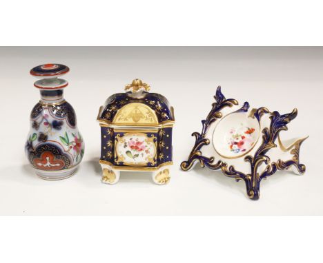 A pair of Coalbrookdale bottle vases and covers, circa 1830-40, of pear shape, applied in high relief with flowers and foliag