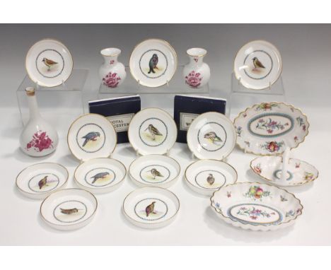 Twelve Royal Worcester circular coasters, each decorated with a game bird, printed marks including 'G676' to bases, diameter 