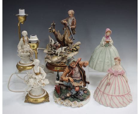 Four Capodimonte figures, including a limited edition Sandro Maggioni figure of an elegant lady, numbered '213/2500', height 