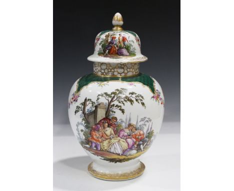 A large Dresden porcelain jar and cover, late 19th century, decorated with courting couples between floral swags, underglaze 