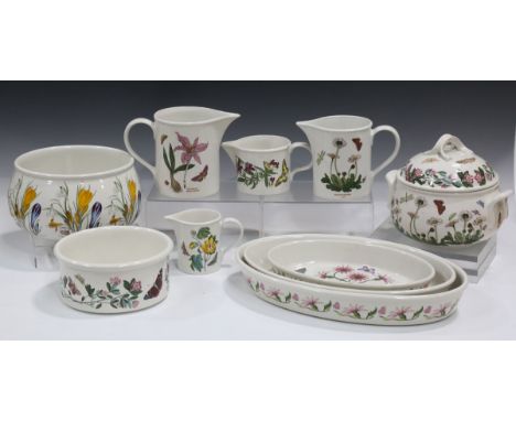 A mixed group of Portmeirion Botanic Garden pattern tablewares, including baking dishes, jugs, butter dish and cover, flan di