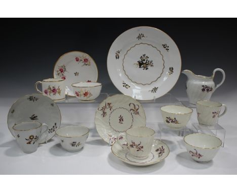 An English porcelain trio, circa 1810, pattern No. 336, painted with sprays of pink flowers on gilt stems, diameter of saucer