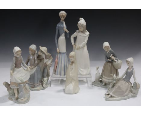 Five Lladro figures, comprising Shepherdess with Dove, No. 4660, Rabbit's Food, No. 4826, Shepherdess with Ducks, No. 4568, G