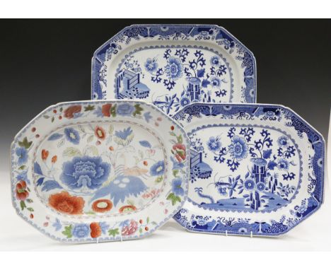 A collection of mostly blue printed earthenwares, including a pair of Spode Bird and Grasshopper pattern platters, early 19th