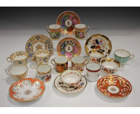 A large mixed group of English porcelain trios, teacups, coffee cans and saucers, late 18th/19th century, mostly Ridgway, inc