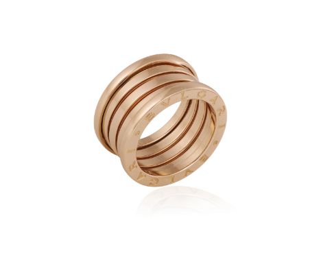 A GOLD 'B-ZERO' RING, BY BULGARI The 18K gold segmented four-band ring, both sides engraved 'Bvlgari', numbered, Italian assa