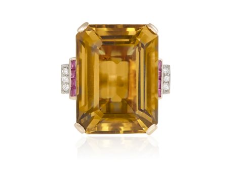 A RETRO GEM-SET COCKTAIL RING, CIRCA 1945 Claw-set with a step-cut citrine measuring approximately 25.17 x 18.89 x 13.24mm, b