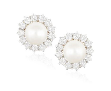 A PAIR OF CULTURED PEARL AND DIAMOND EARRINGS Each round-shaped cultured pearl of cream tint within a frame of round brillian