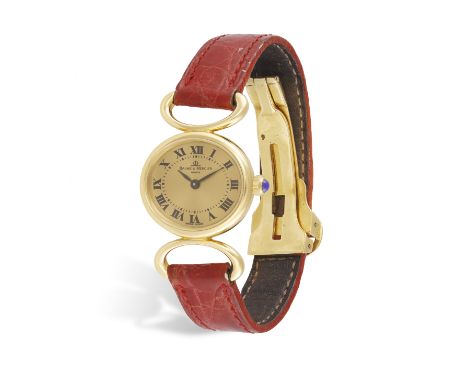 A LADY'S 18K GOLD MANUAL WIND BRACELET WATCH, BY BAUME &amp; MERCIER, CIRCA 1990 17-jewel manual wind movement, with oval cha