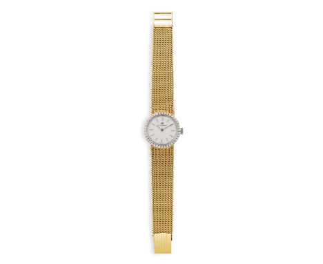 A LADY'S 18K GOLD AND DIAMOND-SET BRACELET WATCH, BY BUCHERER, CIRCA 196517 17-jewel manual wind movement, silvered dial with