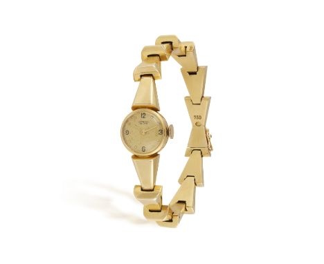 A LADY'S RETRO MANUAL WIND BRACELET WATCH, BY UNIVERSAL, CIRCA 1940 The Cal. 244 manual wind movement, champagne dial with ap