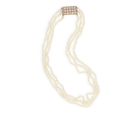 A NATURAL PEARL NECKLACE Composed of three rows of natural pearls, the cream tint pearls measuring approximately 3.07-3.46mm,