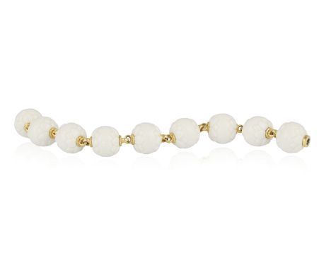 A PORCELAIN 'CHANDRA' BRACELET, BY BULGARI, CIRCA 1995 The uniform series of white porcelain beads with stylised lotus petal 