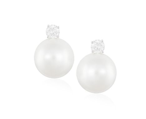 A PAIR OF CULTURED PEARL AND DIAMOND EARRINGS Each round-shaped cultured pearl of white tint measuring approximately 13.57 &a