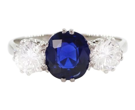 Platinum three stone oval cut sapphire and round brilliant cut diamond ring, sapphire approx 1.40 carat, total diamond weight