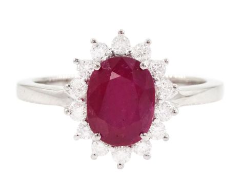 18ct white gold oval cut ruby and round brilliant cut diamond cluster ring, stamped 750, ruby 1.93 carat, total diamond weigh