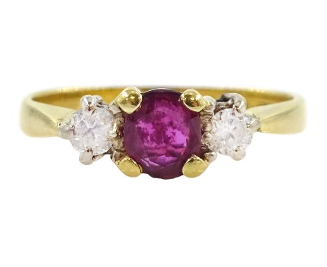 18ct gold three stone ruby and diamond ring, Birmingham 1979, total diamond weight approx 0.15ctCondition Report:Approx 2.4gm