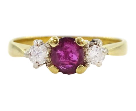 18ct gold three stone ruby and diamond ring, Birmingham 1979, total diamond weight approx 0.15ctCondition Report:Approx 2.4gm