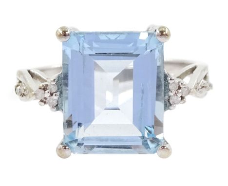 9ct white gold emerald cut blue topaz and diamond ring, hallmarkedCondition Report:Approx 4.2gm, size O-P, topaz = 12mm x 9.8