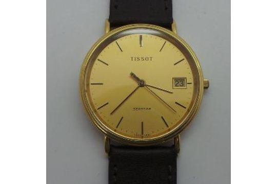 tissot guldklocka