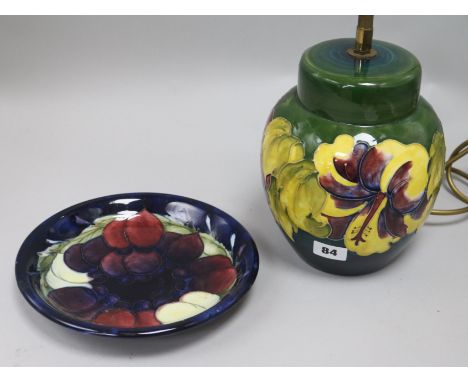 A Moorcroft table lamp and a plate