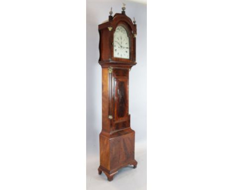 James Spencer of Colne. A George III mahogany eight day longcase clock, the arched silvered dial engraved with an eagle carry