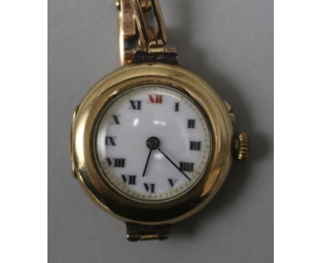 A lady's late 1920's 9ct gold manual wind wrist watch.