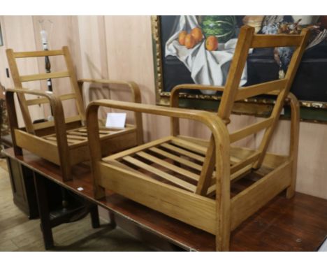 A pair of 1940's natural finish reclining chairs