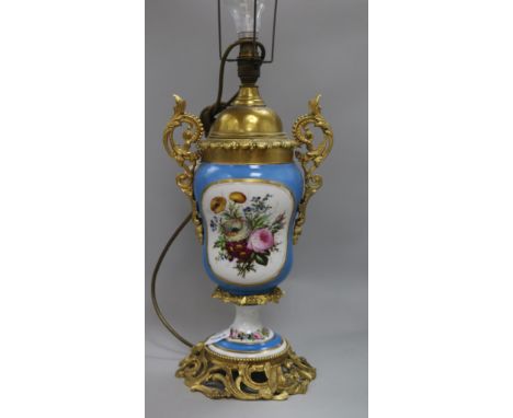 A brass mounted Paris porcelain table lamp