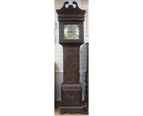 A George III carved oak eight day longcase clock by J. Stancliffe of Barkisland , H.234cm