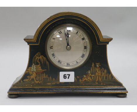 A 1920's black lacquer mantel timepiece