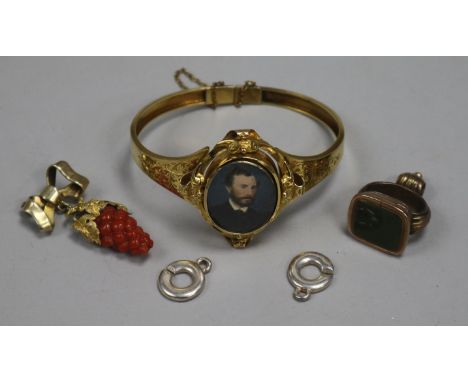 A Victorian gold hinged bangle with inset portrait miniature, a seal and pendant etc.