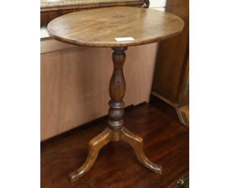 A tripod table, H.69cm